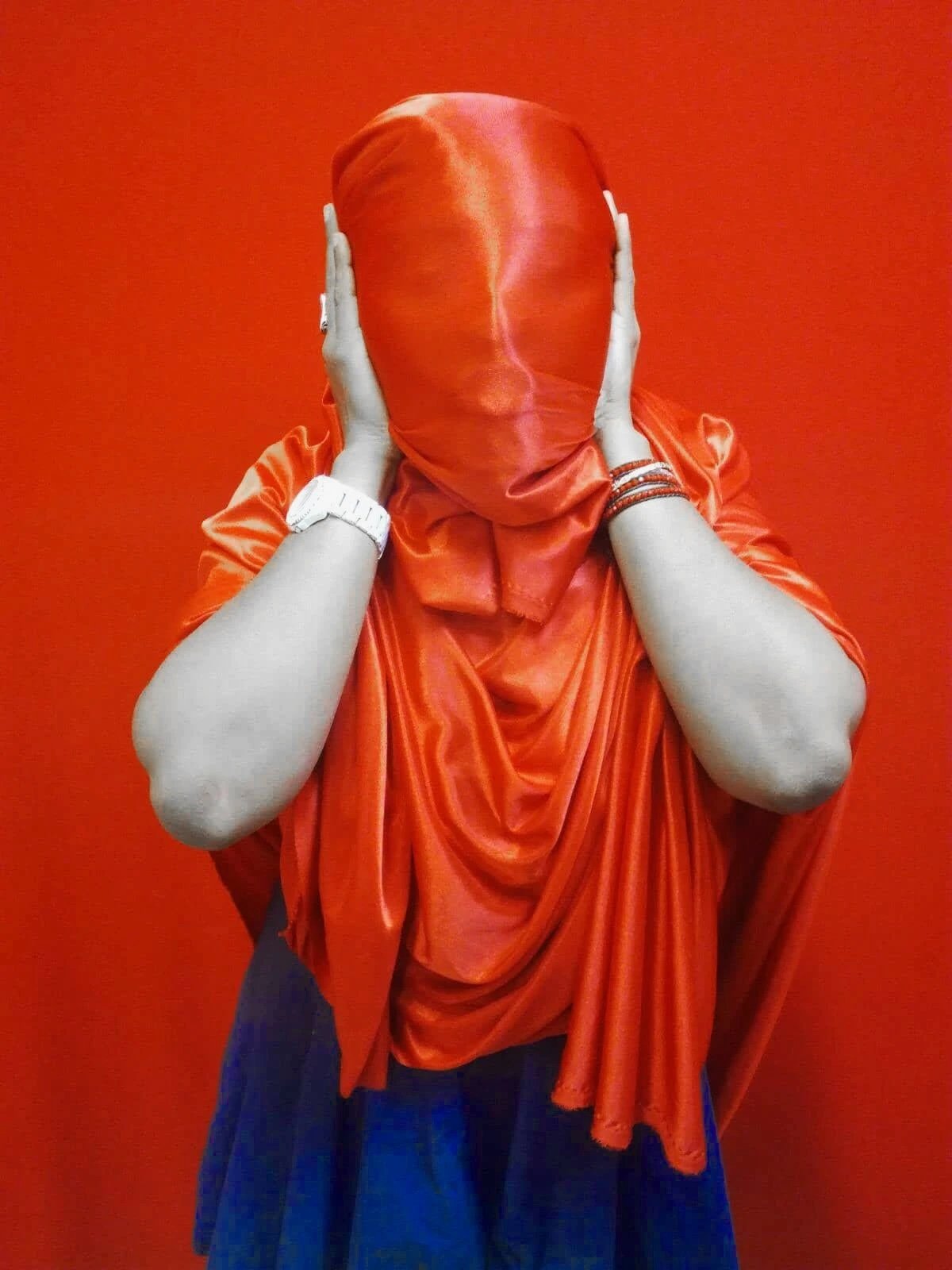 Vishnu in a red-draped performance